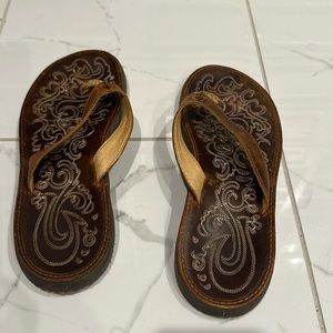 Brown leather Olukai Flip Flops